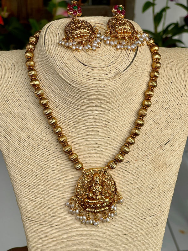 Gold Beads and Goddess Necklace